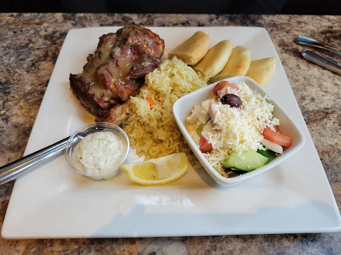 Roast Lamb at Dinakis Mediterranean Grill Port Coquitlam BC - Tender, slow-roasted lamb seasoned with Mediterranean herbs and spices
